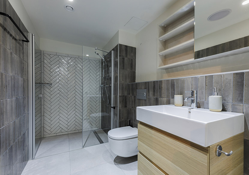 belvillage-aurora-ensuite-bathroom-grey-stone-finish.jpg