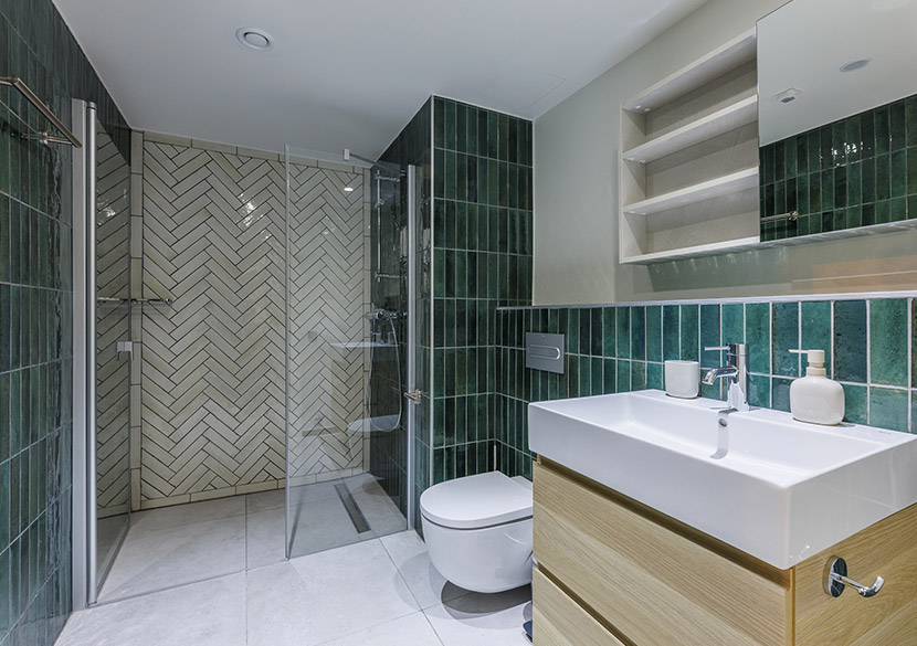 belvillage-aurora-modern-bathroom-green-tiles-walk-in-shower.jpg