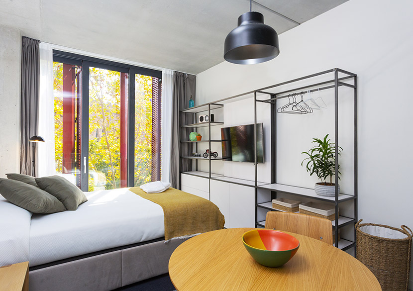 belvillage-diputacio-studio-layout-open-wardrobe-storage.jpg